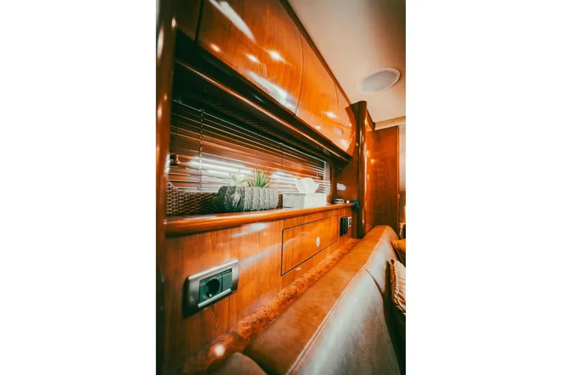  Yacht Photos Pics Interior of 2005 Searay Sundancer 390 yacht with polished wood finish and decor.