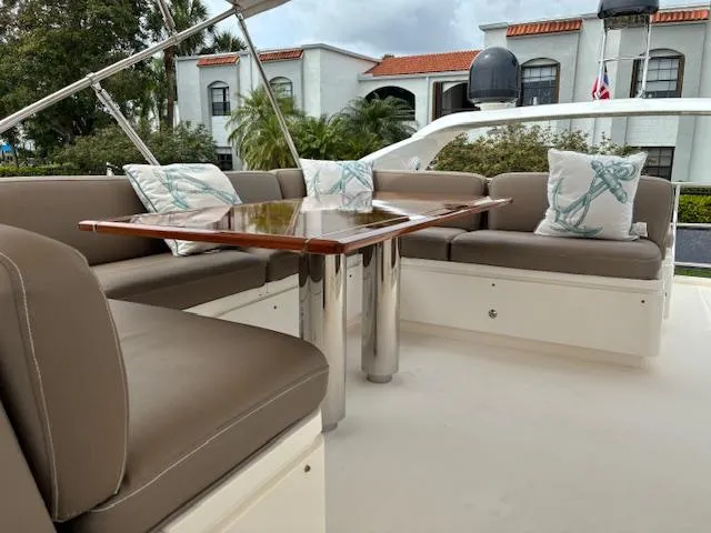 Mv Dream Yacht Photos Pics Luxurious seating area on 2012 Viking Princess Fly yacht with elegant cushions and table.