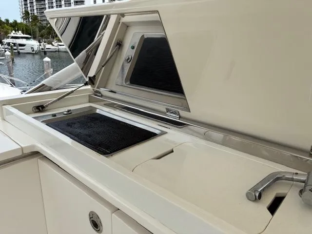 Mv Dream Yacht Photos Pics Outdoor kitchen on 2012 Viking Princess Fly yacht with grill and sink.