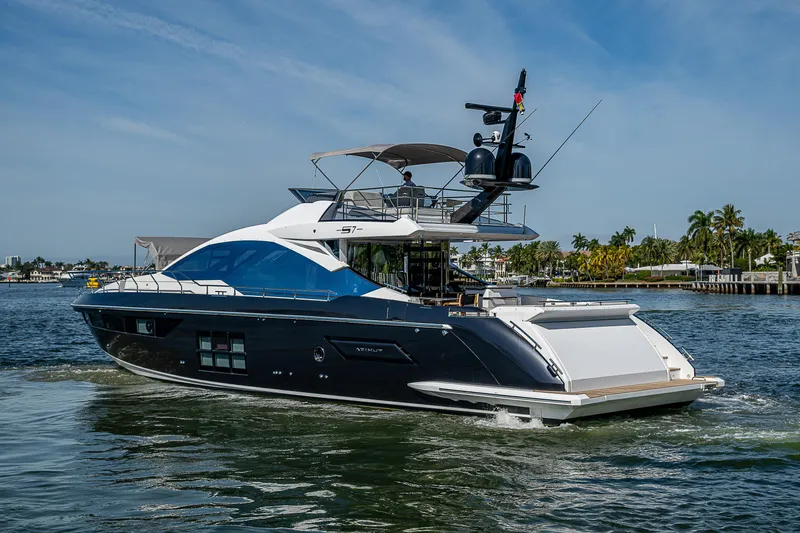  Yacht Photos Pics 2019 Azimut S7 yacht cruising on a sunny day, showcasing sleek design and luxury features.
