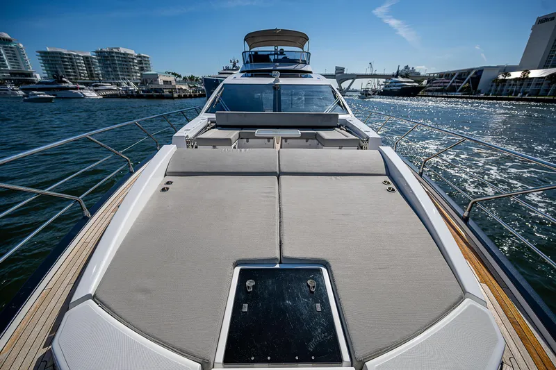  Yacht Photos Pics 2019 Azimut S7 yacht on water, showcasing spacious deck and modern design.