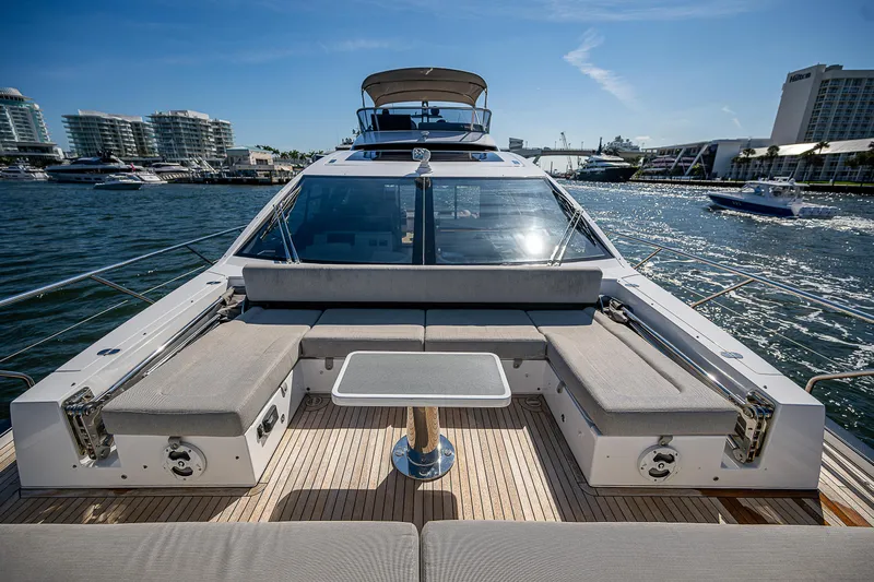  Yacht Photos Pics Luxurious 2019 Azimut S7 yacht with spacious deck seating and scenic waterfront view.