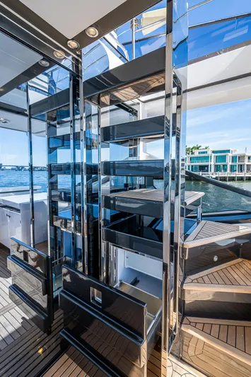  Yacht Photos Pics Luxurious 2019 Azimut S7 yacht interior with sleek modern staircase and waterfront view.