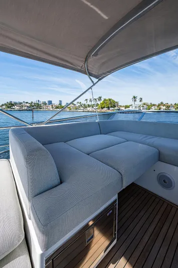  Yacht Photos Pics 2019 Azimut S7 yacht with luxurious seating, overlooking serene waterfront views.