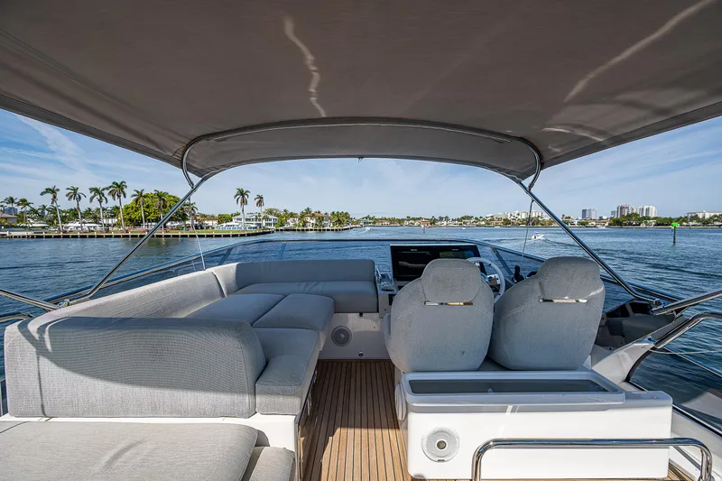  Yacht Photos Pics 2019 Azimut S7 yacht interior with seating, helm, and scenic water view.