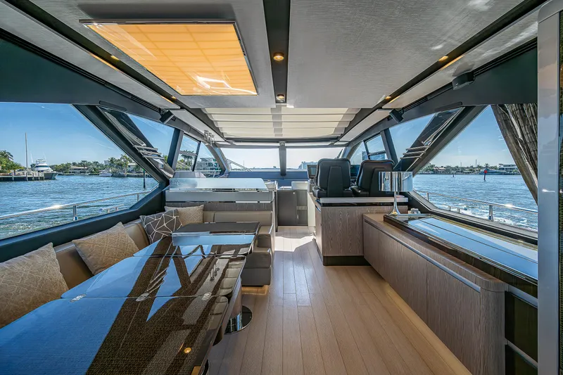  Yacht Photos Pics Luxurious interior of 2019 Azimut S7 yacht with panoramic windows and modern furnishings.