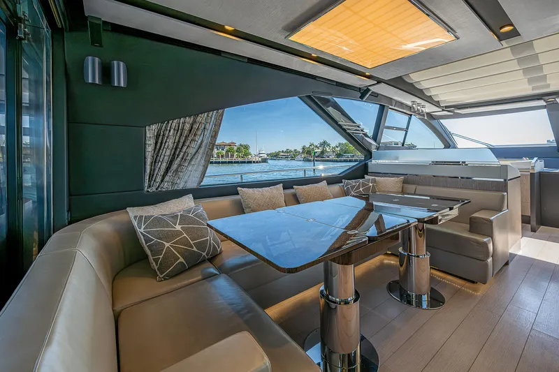  Yacht Photos Pics Luxurious interior of 2019 Azimut S7 yacht with elegant seating and panoramic windows.