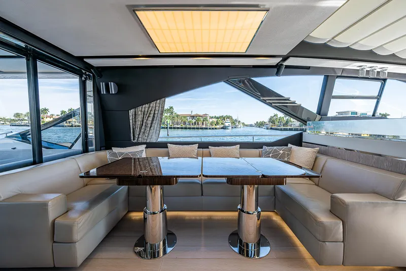  Yacht Photos Pics Luxurious interior of 2019 Azimut S7 yacht with elegant seating and dining area.