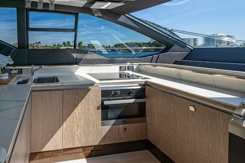  Yacht Photos Pics Modern kitchen interior on 2019 Azimut S7 yacht with sleek design and ocean view.