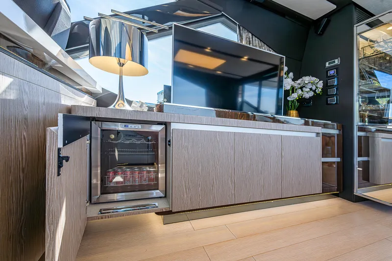  Yacht Photos Pics Luxurious interior of 2019 Azimut S7 yacht featuring modern cabinetry and elegant decor.