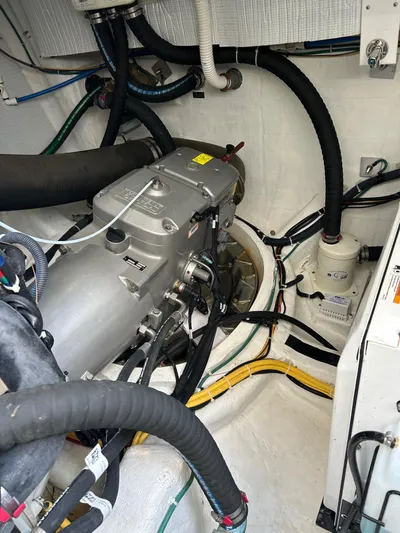 Fil The Tide Yacht Photos Pics Engine room of 2021 Sabre 48 Salon Express with visible machinery and wiring.