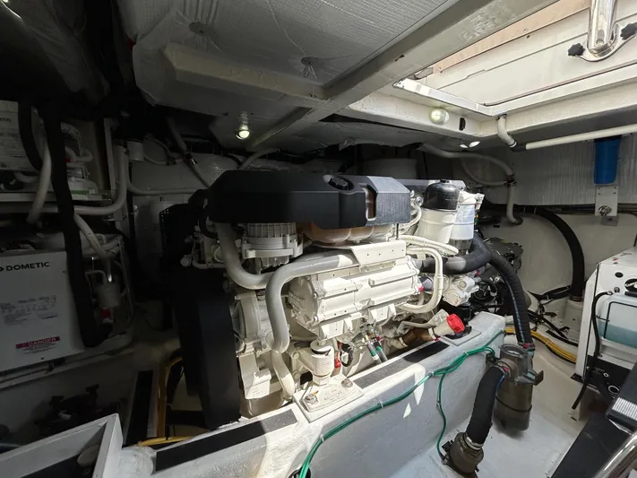 Fil The Tide Yacht Photos Pics Engine room of a 2021 Sabre 48 Salon Express yacht, showcasing mechanical components.