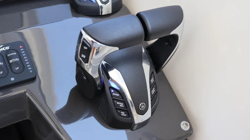  Yacht Photos Pics Throttle controls on 2023 Pursuit OS 355 Offshore boat dashboard.