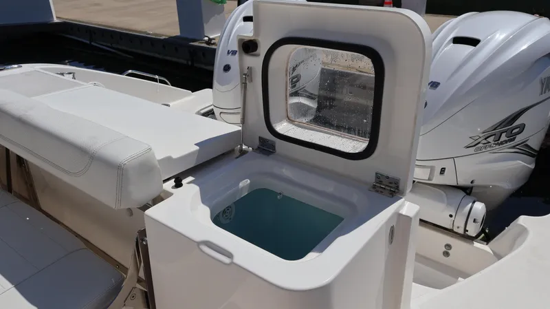  Yacht Photos Pics 2023 Pursuit OS 355 Offshore boat with open storage compartment and powerful engines.