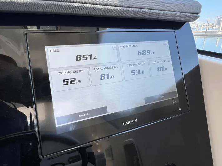  Yacht Photos Pics Garmin display on 2023 Pursuit OS 355 Offshore showing fuel usage and trip data.