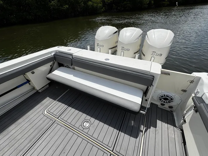  Yacht Photos Pics 2005 Hydra-Sports 3300 VX boat with triple outboard engines and spacious seating area.