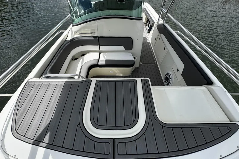  Yacht Photos Pics 2005 Hydra-Sports 3300 VX boat interior with cushioned seating and deck.