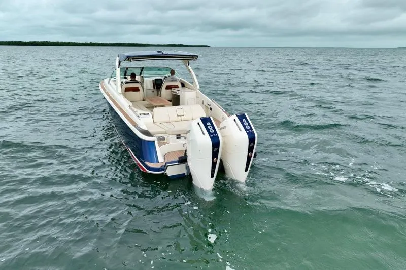 Twin Tides Yacht Photos Pics 2024 Chris-Craft Launch 35 GT boat on open water, showcasing dual engines.