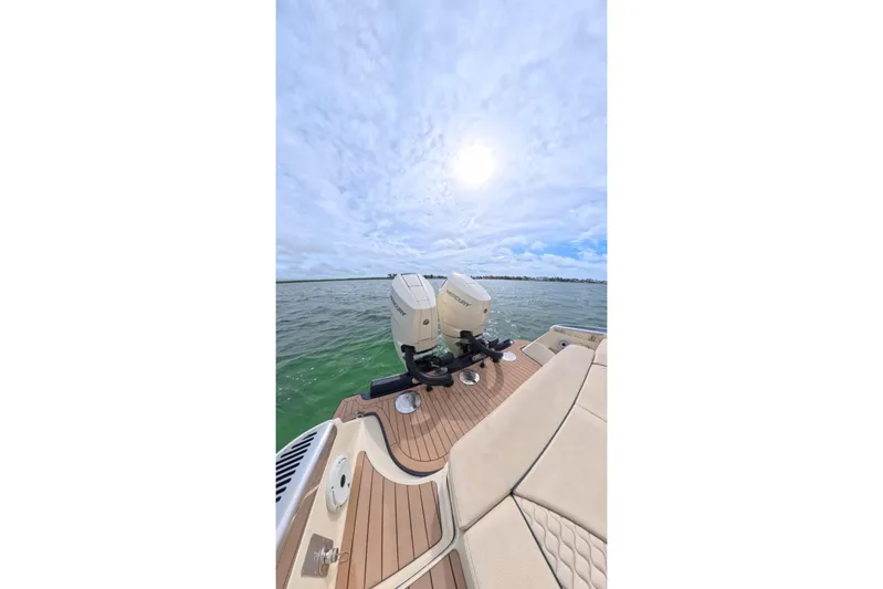 Twin Tides Yacht Photos Pics 2024 Chris-Craft Launch 35 GT boat with twin Mercury engines on open water.