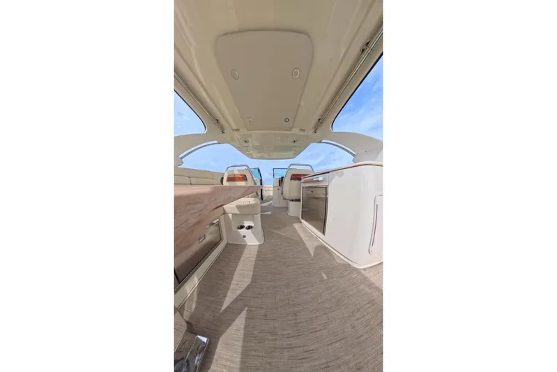 Twin Tides Yacht Photos Pics 2024 Chris-Craft Launch 35 GT interior with elegant seating and modern amenities.