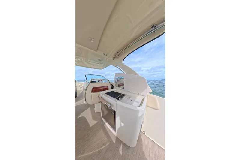 Twin Tides Yacht Photos Pics 2024 Chris-Craft Launch 35 GT interior with ocean view, featuring sleek design and modern amenities.