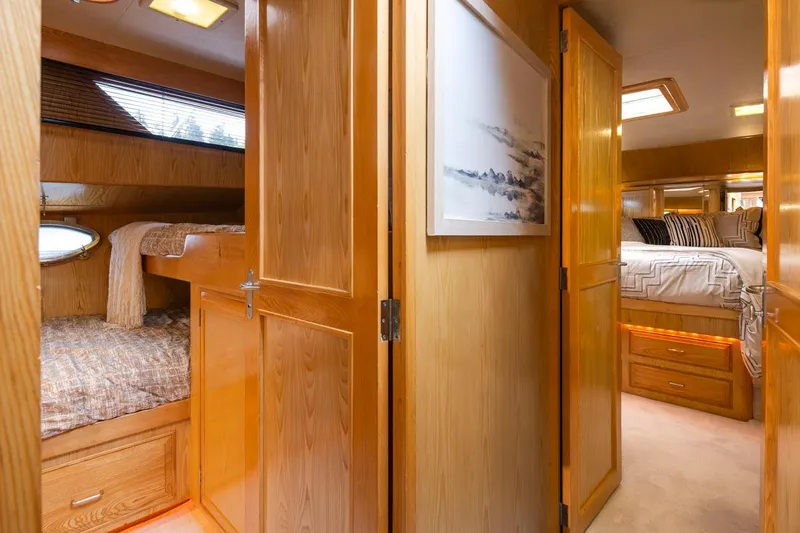  Yacht Photos Pics Interior of 1989 Ocean Alexander 50 Sedan yacht with cozy wooden cabin design.