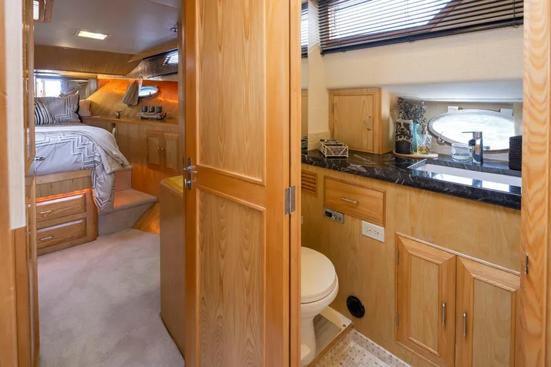  Yacht Photos Pics Interior of 1989 Ocean Alexander 50 Sedan yacht, featuring bedroom and bathroom.