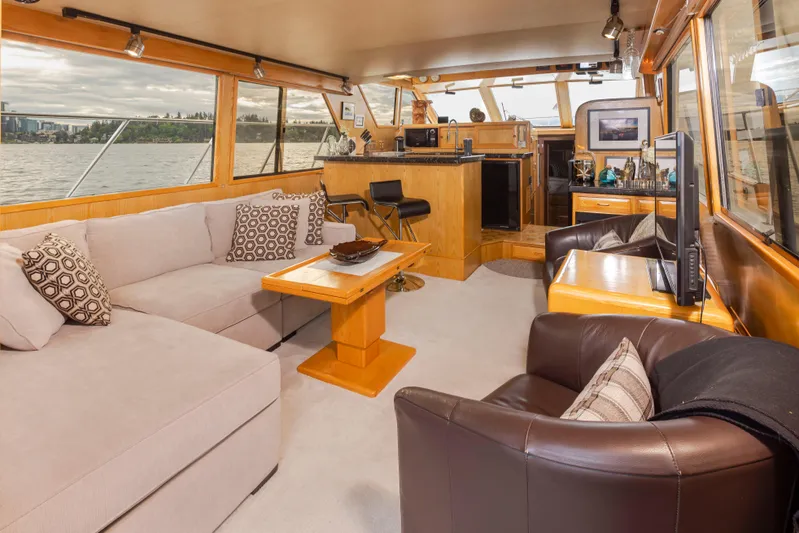  Yacht Photos Pics Luxurious interior of a 1989 Ocean Alexander 50 Sedan yacht with comfortable seating and elegant decor.