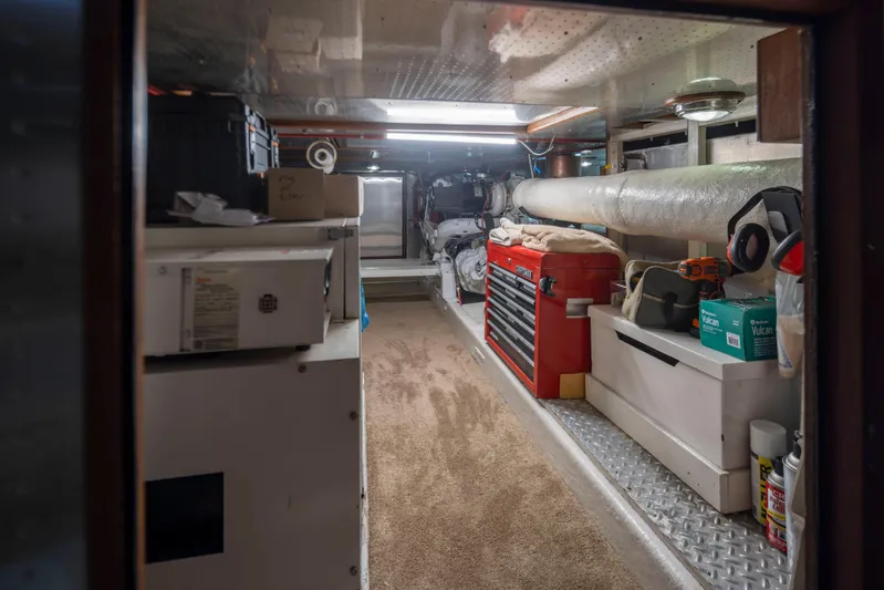  Yacht Photos Pics Engine room of 1989 Ocean Alexander 50 Sedan with tools and equipment.