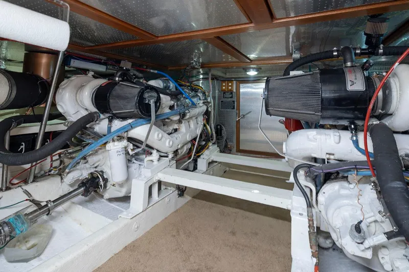  Yacht Photos Pics Engine room of 1989 Ocean Alexander 50 Sedan with dual engines and mechanical components.
