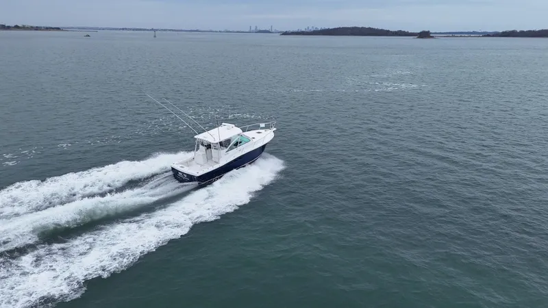  Yacht Photos Pics 2011 Rampage 34 IPS boat cruising on open water.