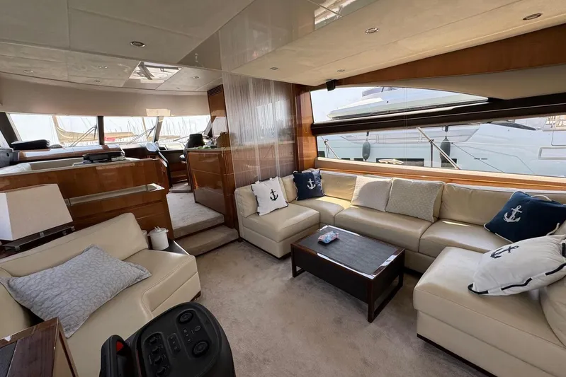  Yacht Photos Pics Luxurious interior of a 2012 Princess 60 yacht with elegant seating and nautical decor.