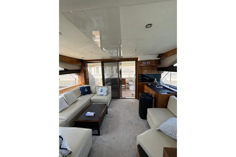  Yacht Photos Pics Luxurious interior of a 2012 Princess 60 yacht with elegant seating and decor.