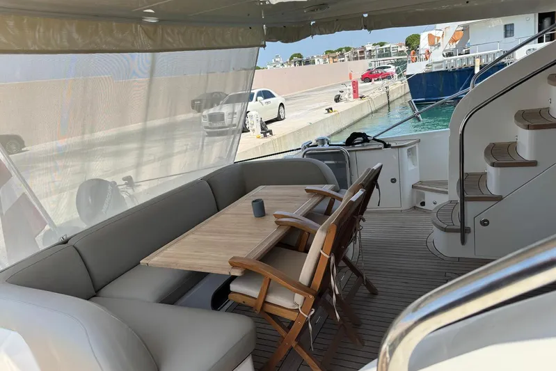  Yacht Photos Pics Luxurious 2012 Princess 60 yacht interior with elegant seating and dining area.