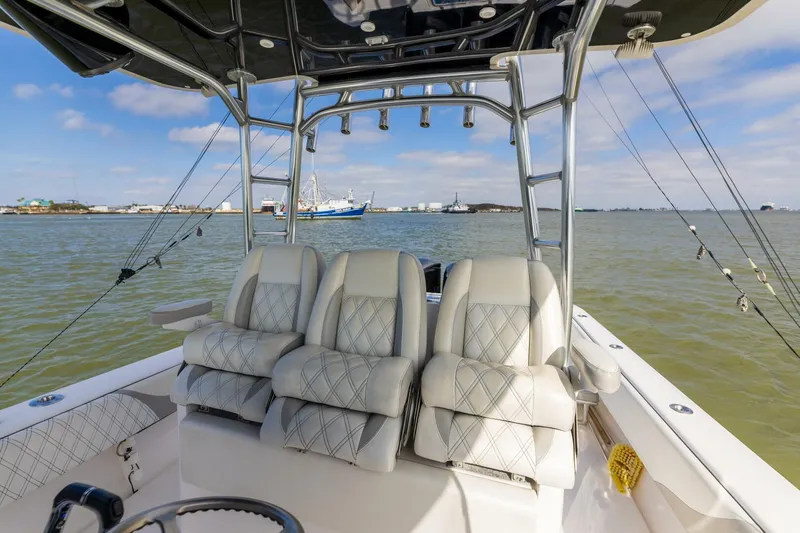 Fools Gold Yacht Photos Pics 2017 Contender 39 Fish Around boat interior with cushioned seats on open water.