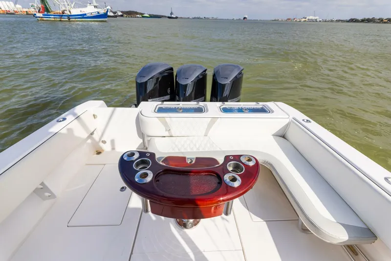 Fools Gold Yacht Photos Pics 2017 Contender 39 Fish Around boat with triple engines on open water.