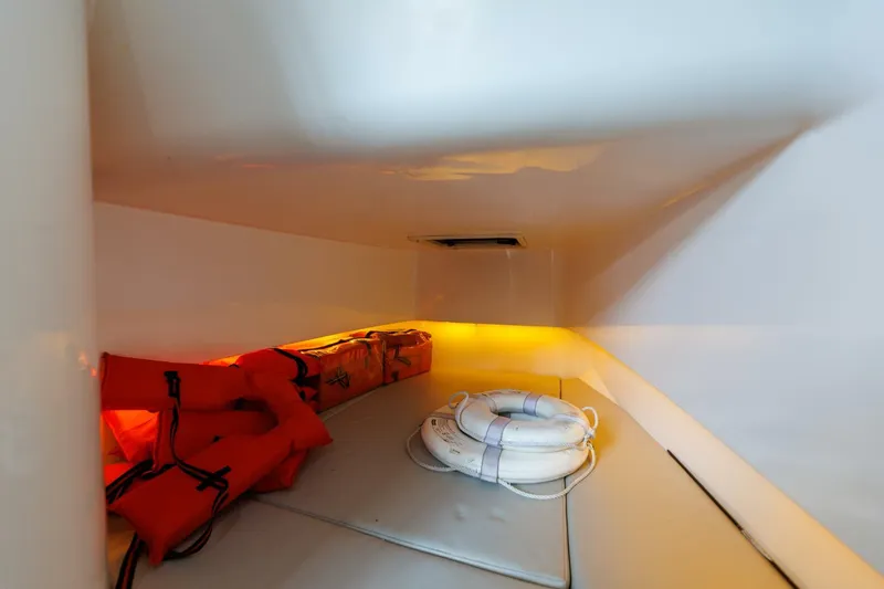 Fools Gold Yacht Photos Pics Interior storage of 2017 Contender 39 Fish Around with life jackets and a life ring.