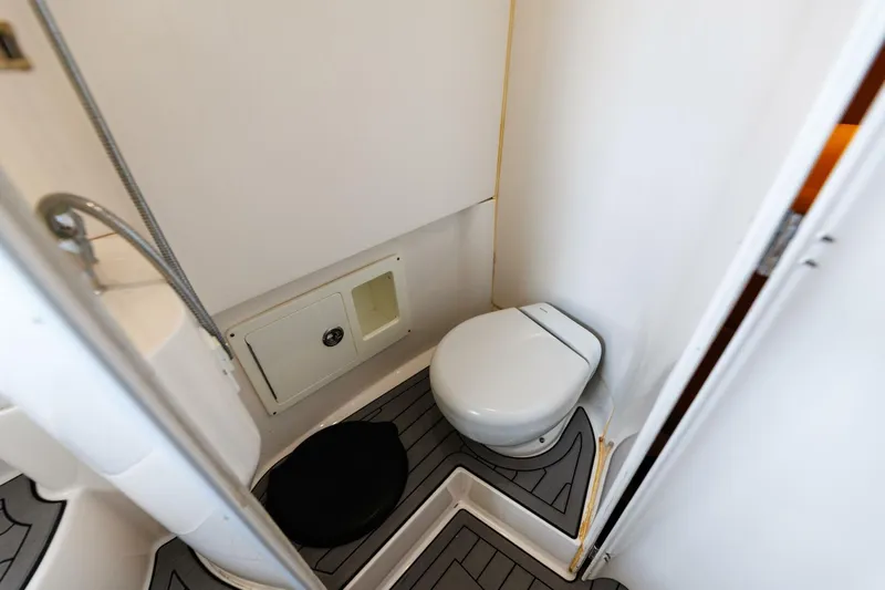 Fools Gold Yacht Photos Pics 2017 Contender 39 Fish Around boat bathroom with toilet and shower area.