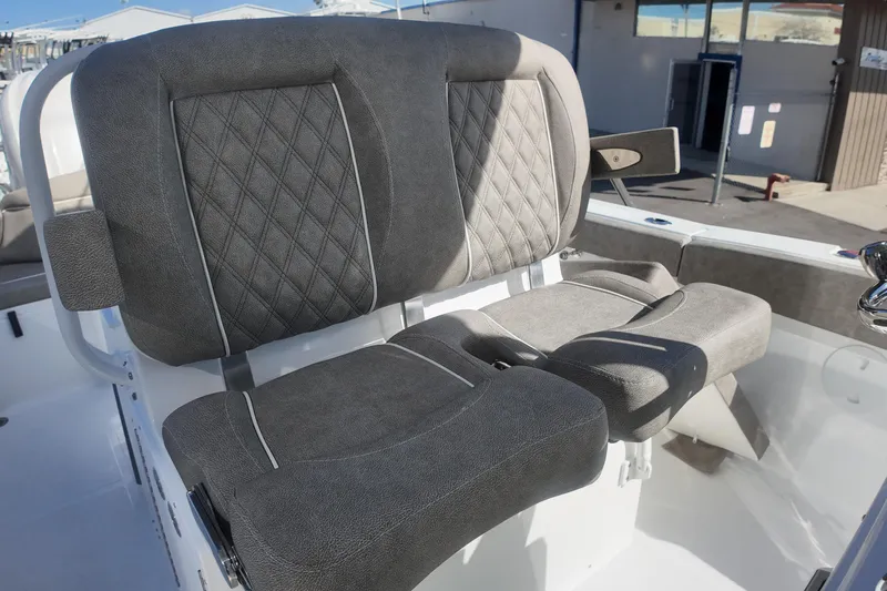  Yacht Photos Pics 2025 Sea Hunt Ultra 275 SE boat seats with diamond-patterned upholstery.