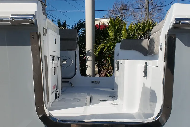  Yacht Photos Pics 2025 Sea Hunt Ultra 275 SE boat interior with seating and storage compartments.
