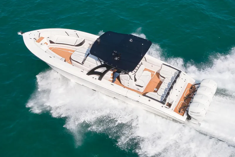  Yacht Photos Pics 2020 Midnight Express 37' Open boat cruising on the water.