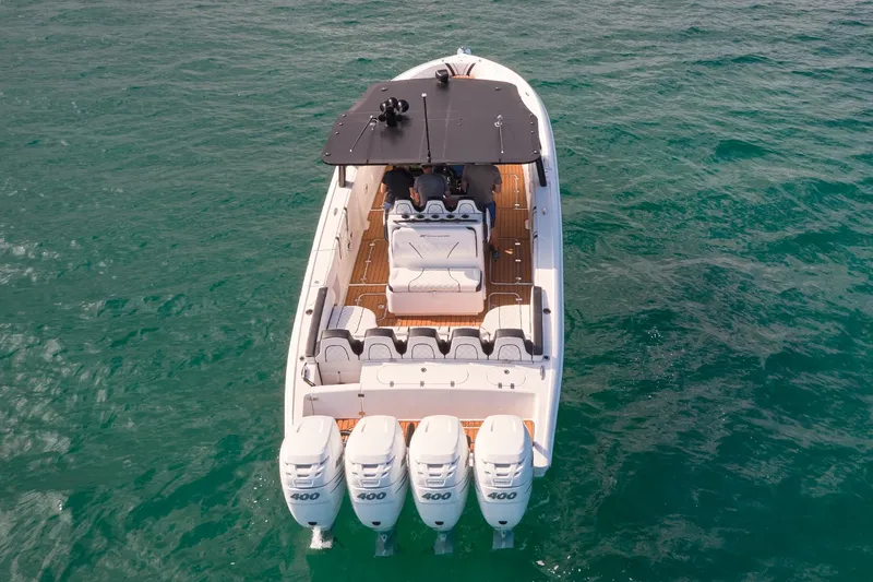  Yacht Photos Pics 2020 Midnight Express 37' Open boat with quad 400 engines on the water.