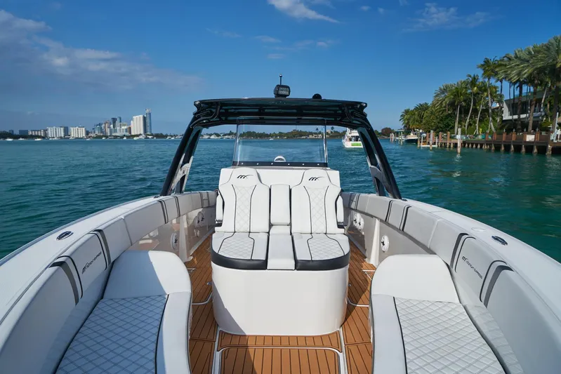  Yacht Photos Pics 2020 Midnight Express 37' Open boat with luxurious seating on a sunny day.