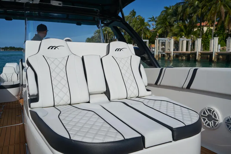  Yacht Photos Pics Luxurious seating on a 2020 Midnight Express 37' Open boat, with waterfront view.