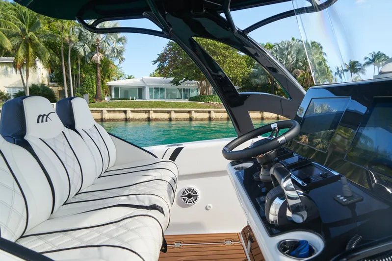  Yacht Photos Pics Interior of 2020 Midnight Express 37' Open boat with luxurious seating and modern controls.
