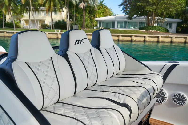  Yacht Photos Pics Luxurious seating on a 2020 Midnight Express 37' Open boat with waterfront view.