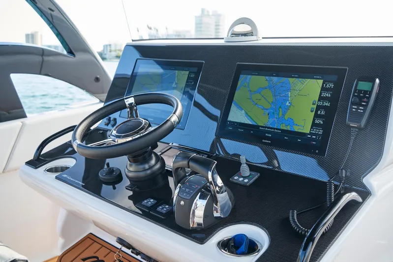 Yacht Photos Pics 2020 Midnight Express 37' Open boat dashboard with navigation screens and controls.