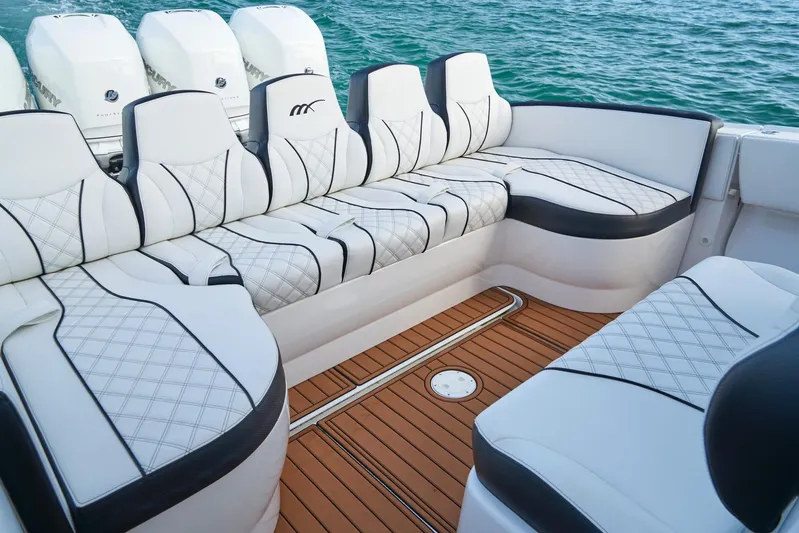  Yacht Photos Pics Luxurious seating on a 2020 Midnight Express 37' Open boat with teak flooring.