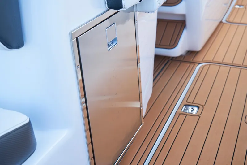  Yacht Photos Pics Stainless steel storage compartment on 2020 Midnight Express 37' Open boat with teak flooring.