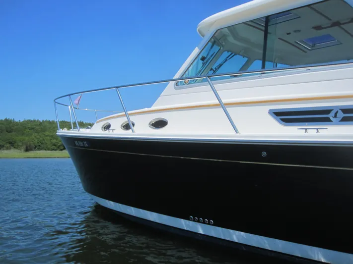  Yacht Photos Pics 2014 Back Cove 34 Hard Top boat on water, side view.